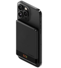 Black phone wireless charger on a gray background